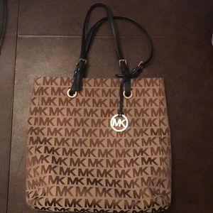 USED Authentic Michael Kors tan and navy tote